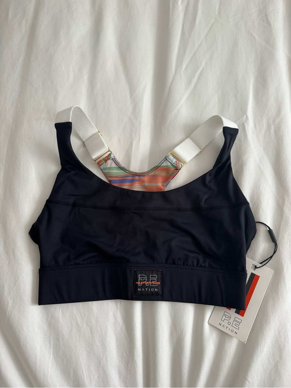 P.E Nation Black Sports Bra with Multicolor Striped Back Panel